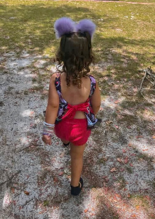 Daisy Tie Back Peplum